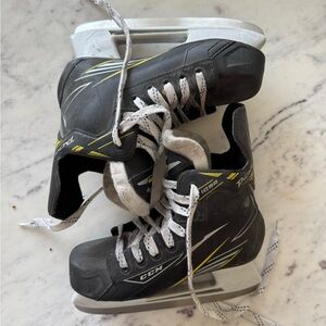 CCM Kids Black and Yellow Ice Skates